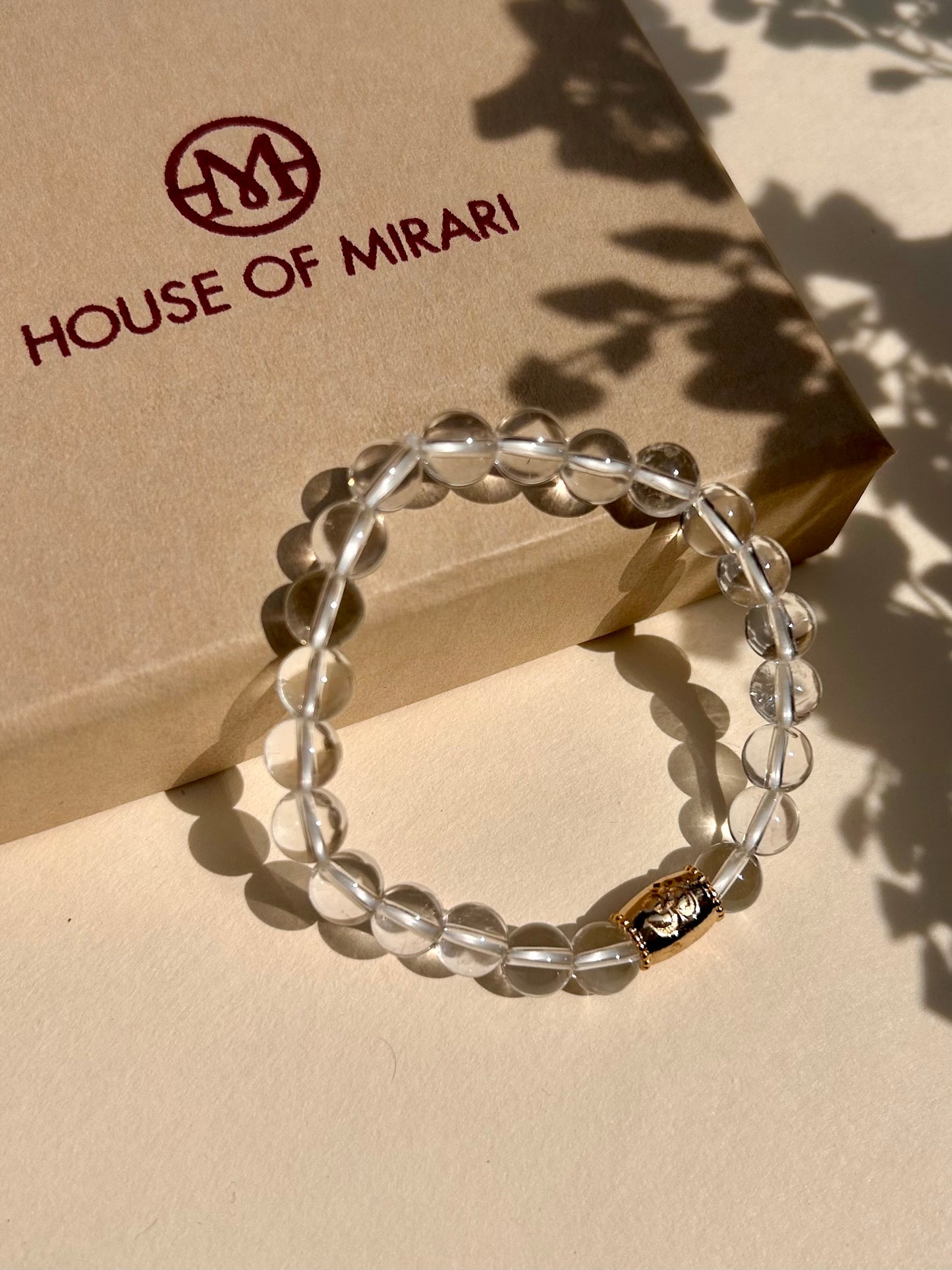 Clear Quartz Unisex Bead Bracelet with Om Motif
