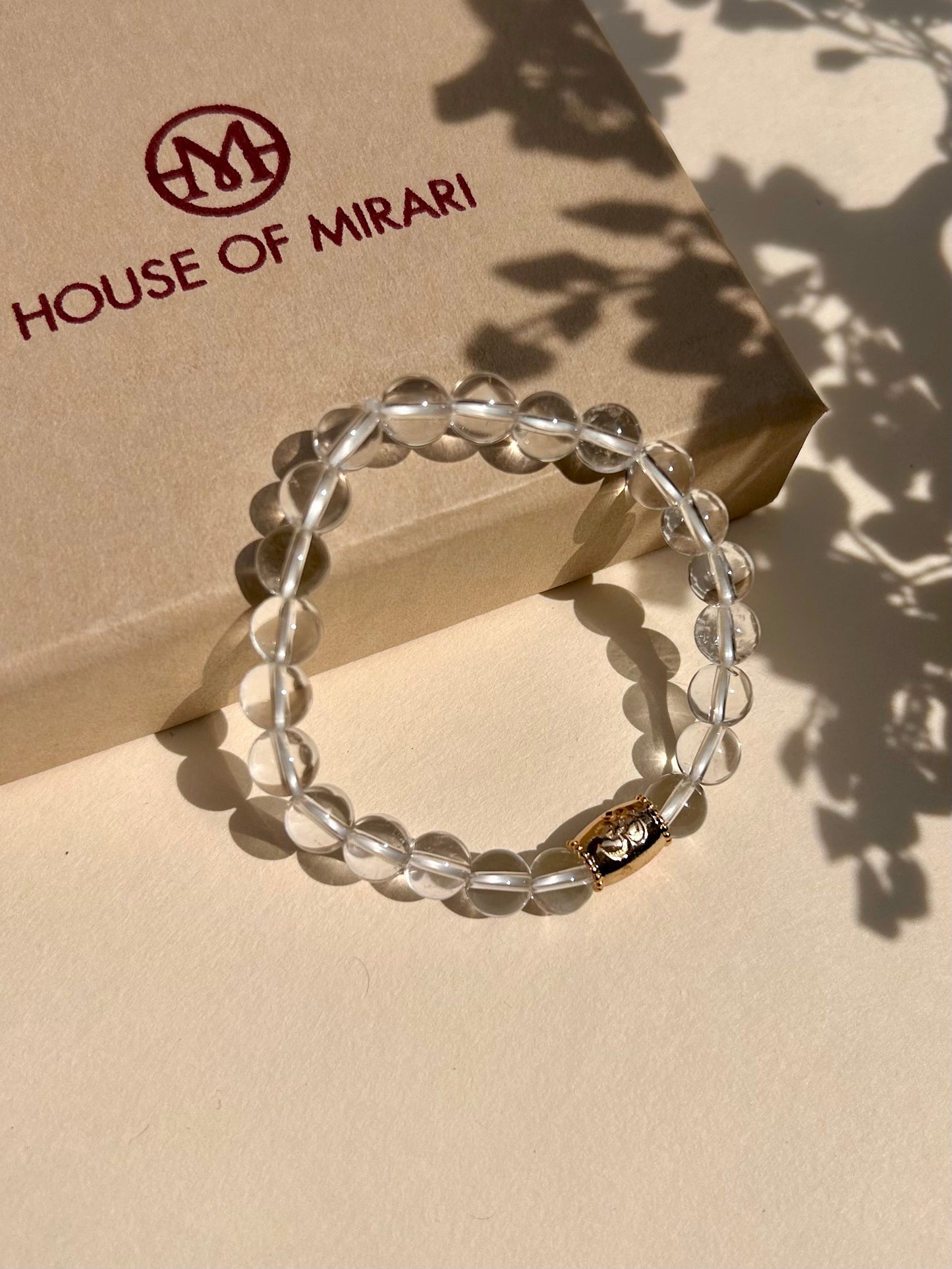 Clear Quartz Unisex Bead Bracelet with Om Motif