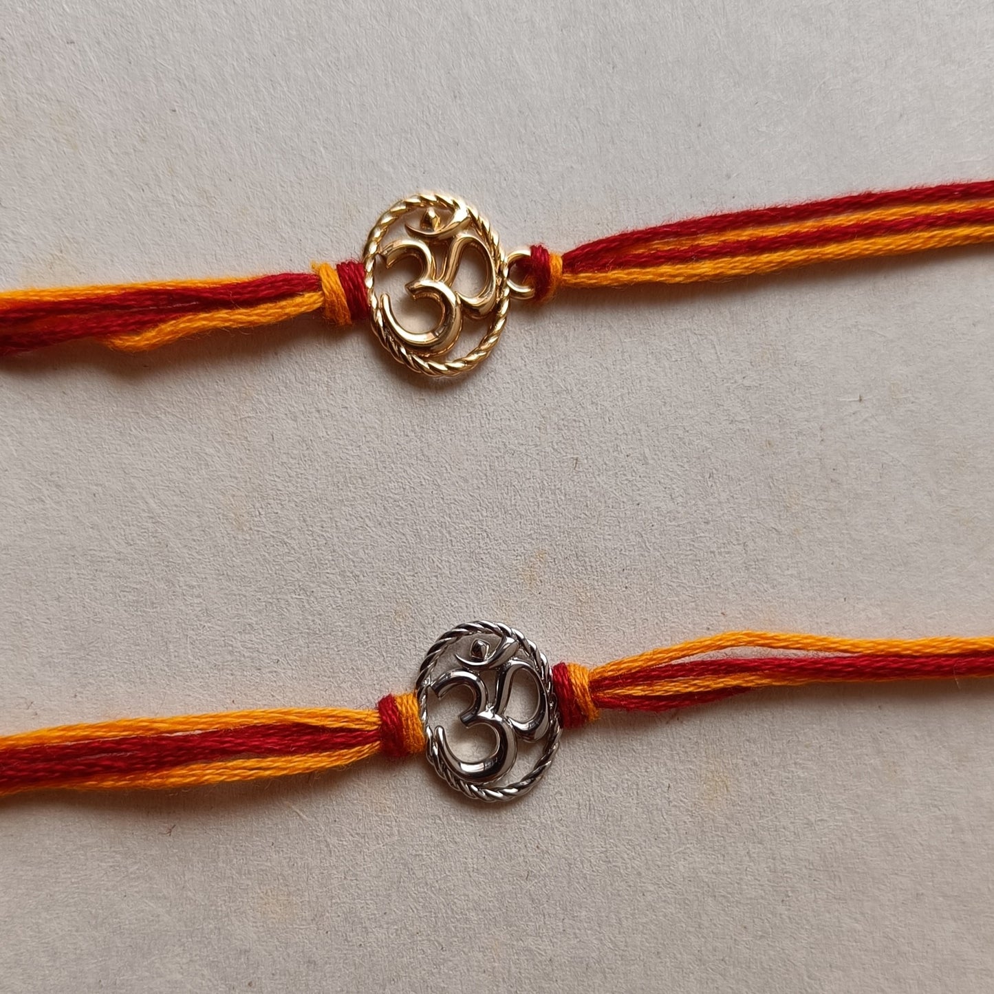 Sacred Om 22kt Gold Plated Silver Rakhi
