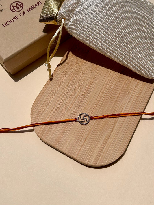 Divine Swastik Rhodium-Plated Silver Rakhi