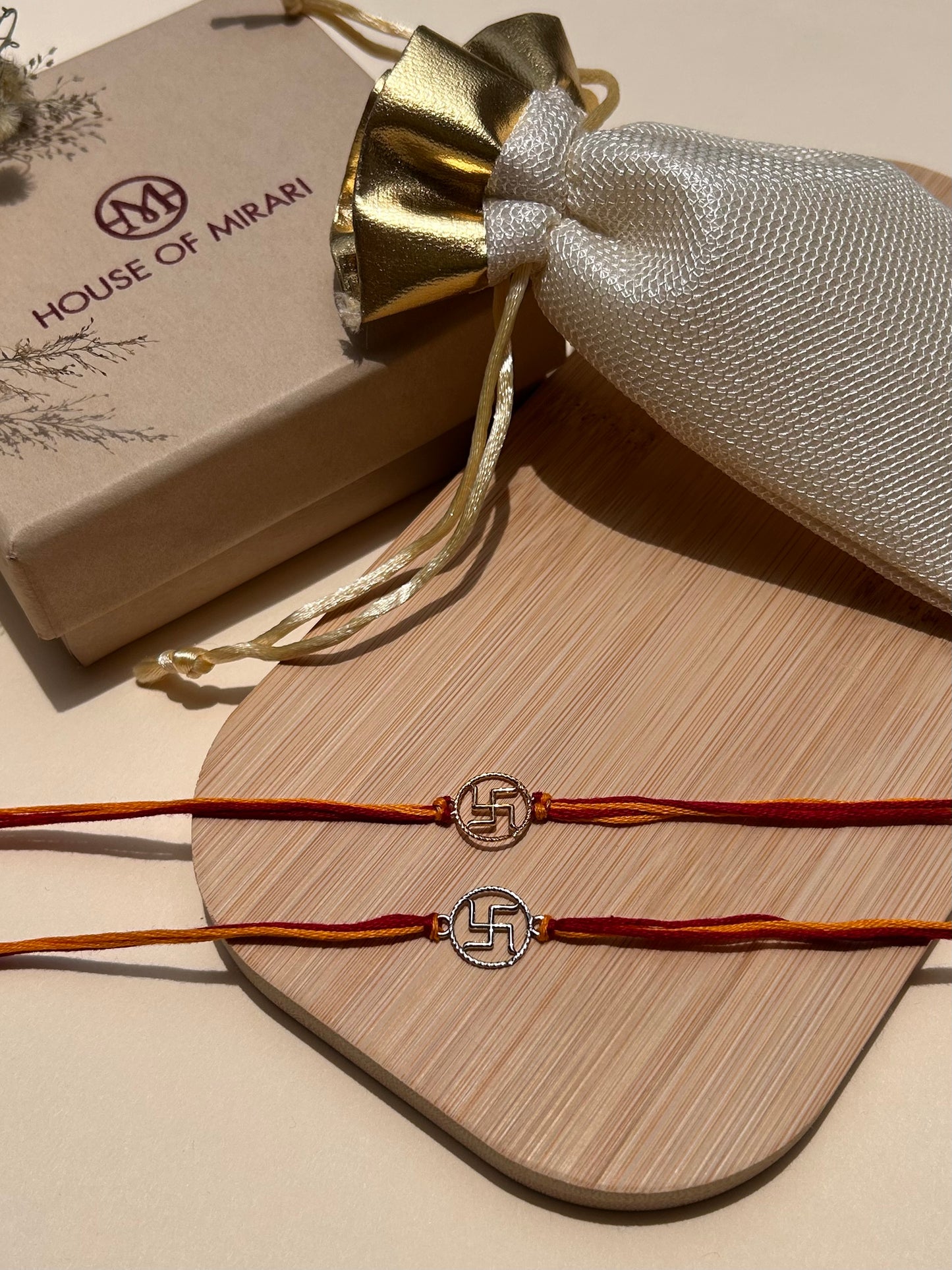 Divine Swastik Rhodium-Plated Silver Rakhi