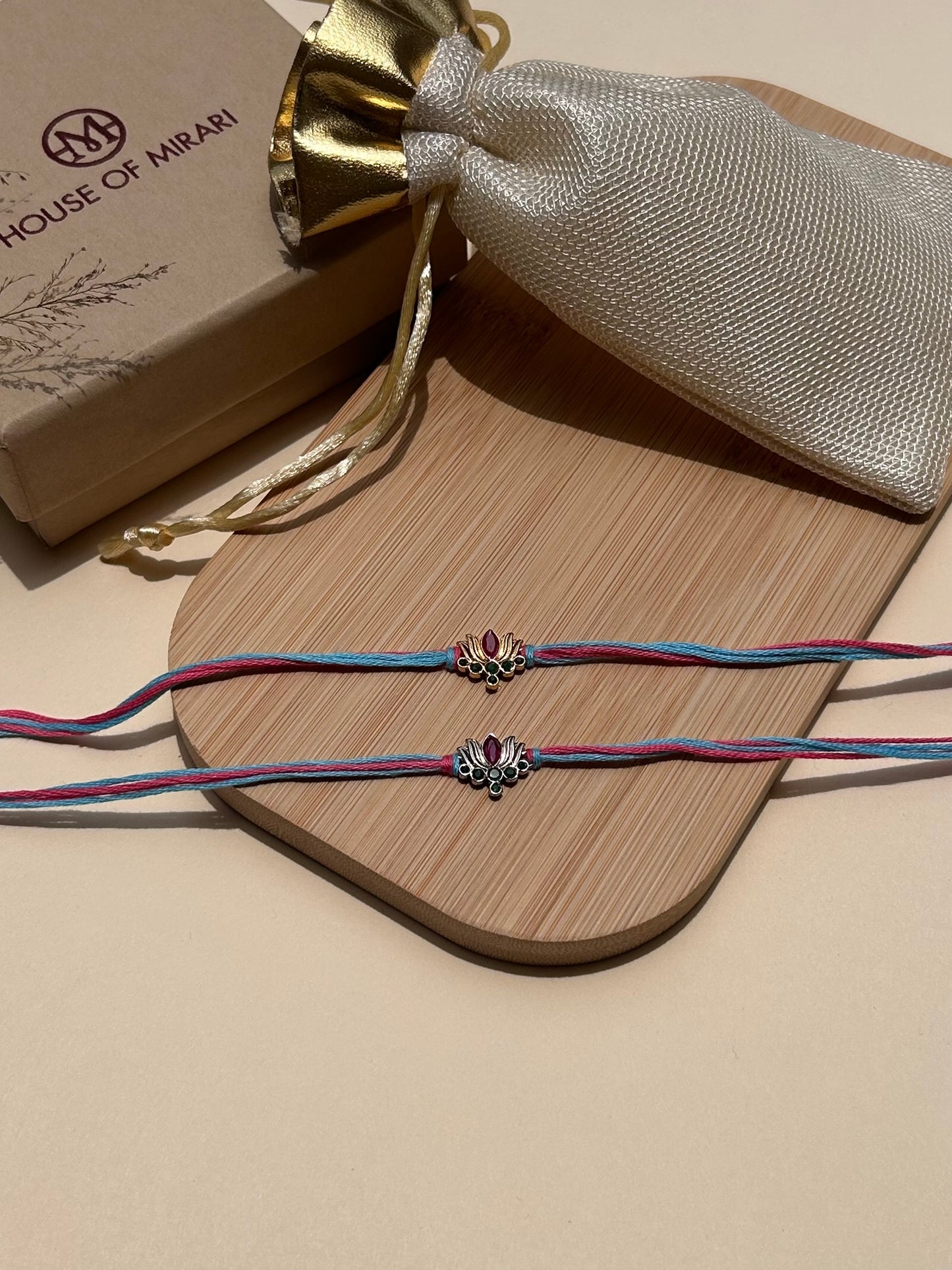 Lotus Elegance 22kt Gold Plated Silver Rakhi