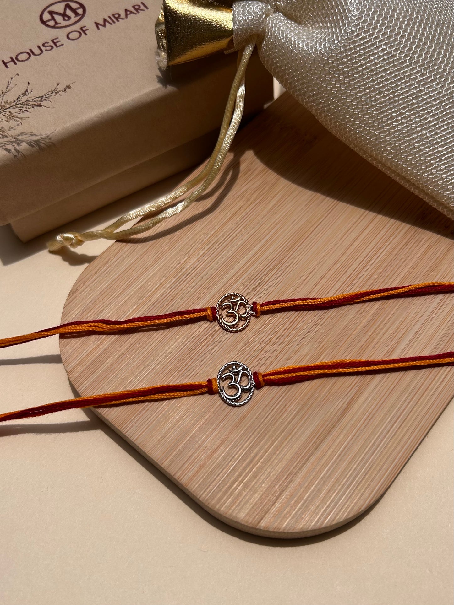 Sacred Om Rhodium-Plated Silver Rakhi