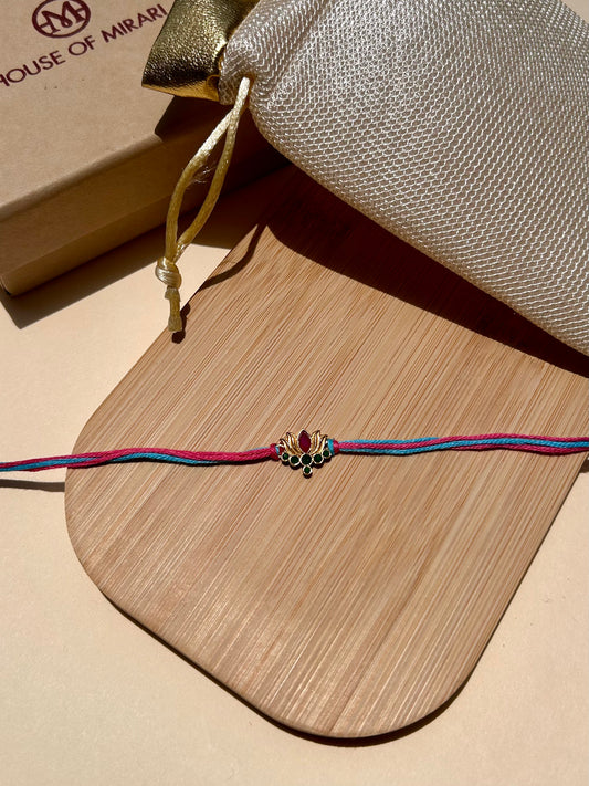 Lotus Elegance 22kt Gold Plated Silver Rakhi